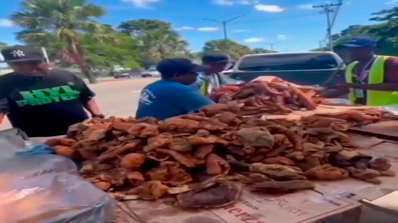 Indignación por incautación de mesa de chicharrones en Santo Domingo Norte