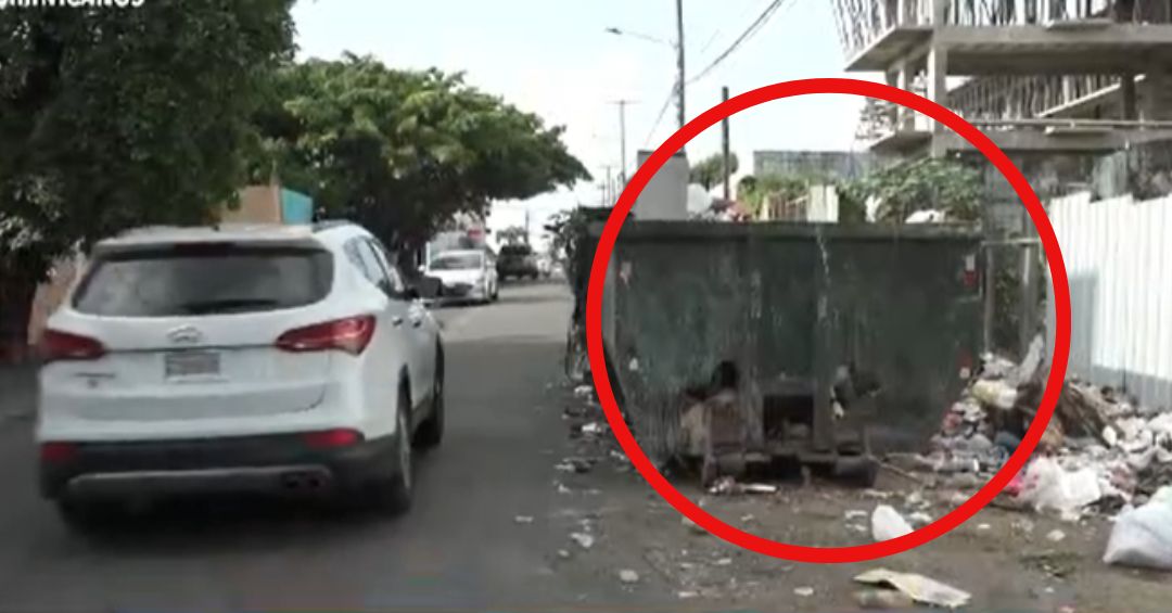 Contenedor obliga a peatones a bajar a la calle en Alma Rosa